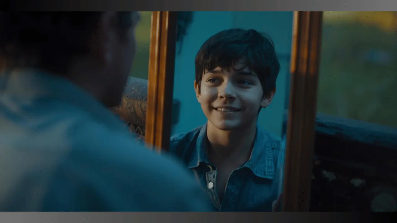 An adult looking into a mirror and seeing a reflection of their younger self